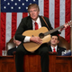 Illustration for article titled Acoustic-Guitar-Wielding Trump Tells Congress ‘This Here’s The Story Of America’